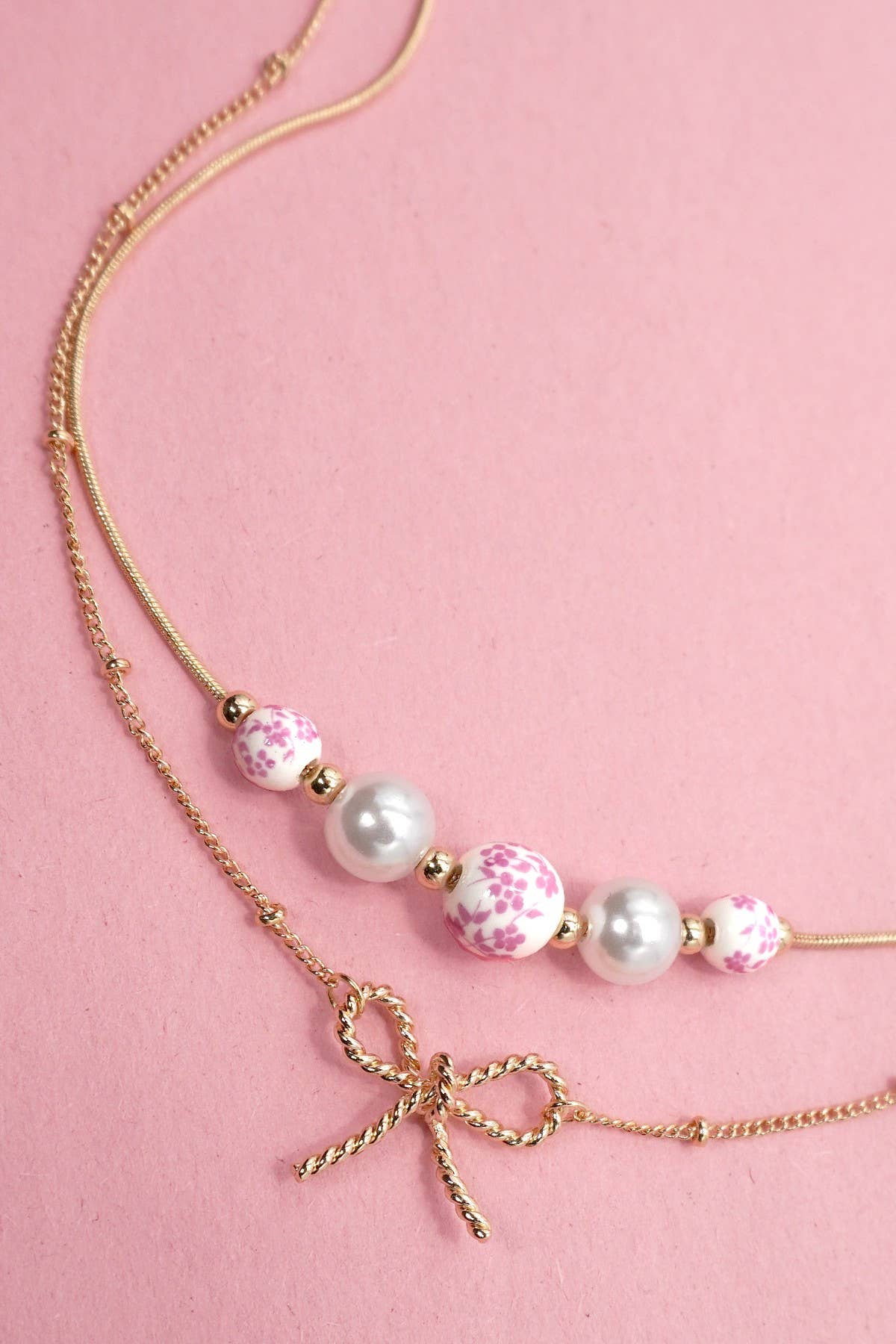 PORCELAIN PEARL BOW LAYER NECKLACE